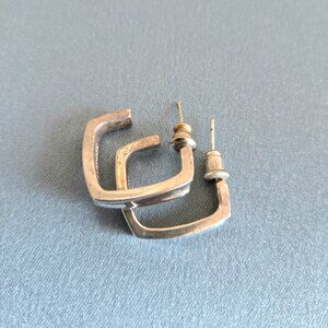 Sterling silver hoops earrings.